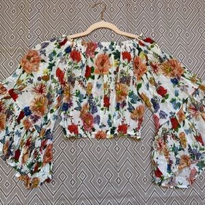 Vici Off-Shoulder Floral Crop Top in White with Red, Orange, Purple Accents